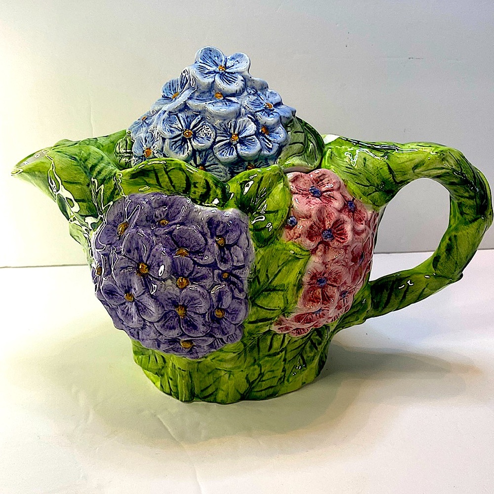 PREOWNED WORLD BAZAAR INC 3D HAND PAINTED TEA POT SMALL IMPERFECTION ON HANDLE